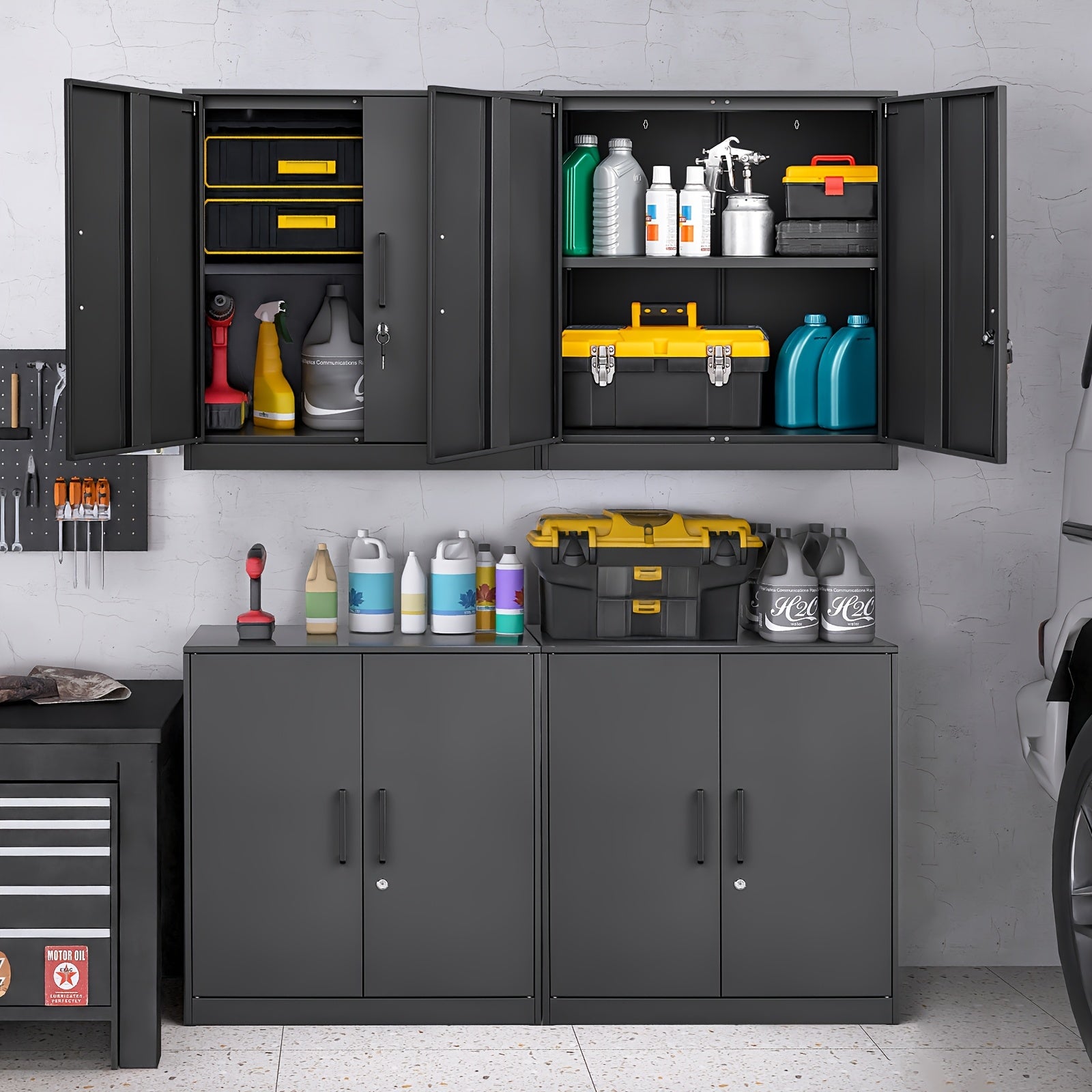 Garage storage cabinets with open doors displaying tools and supplies against a gray wall.