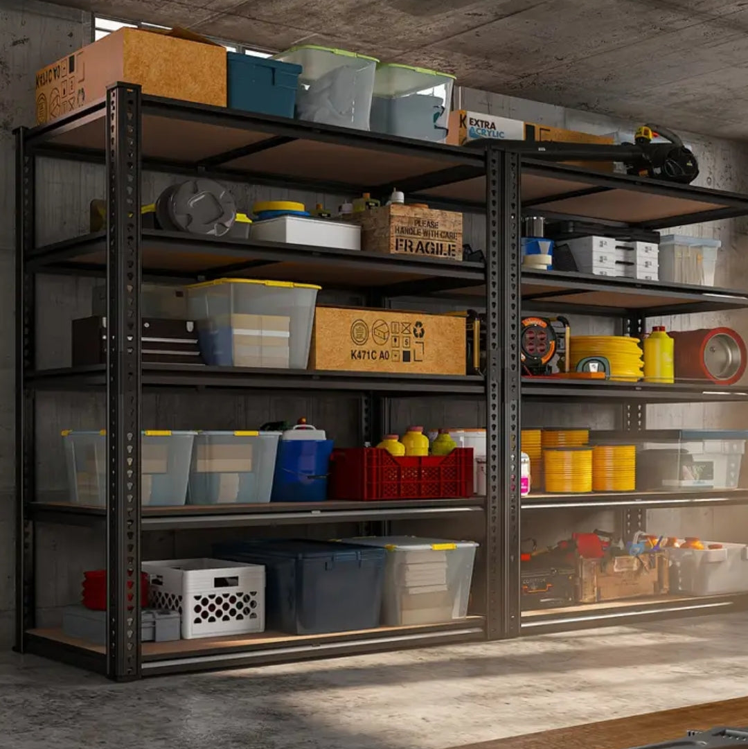 Storage shelves with various boxes and containers in a concrete room.