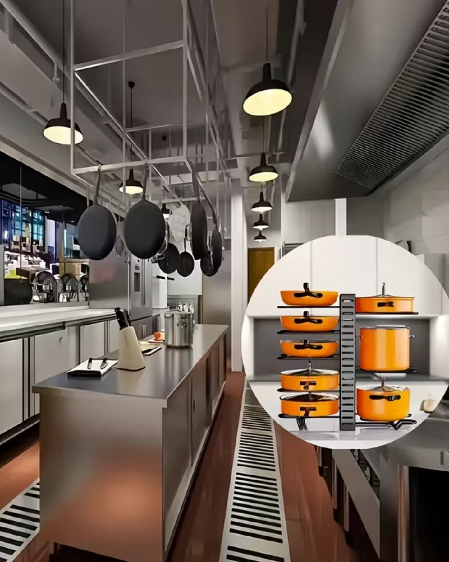 Modern kitchen interior with hanging pots and a close-up of orange cookware.